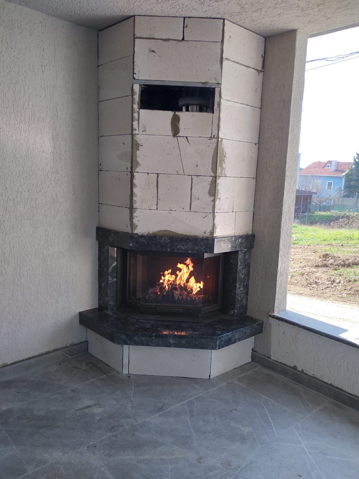 1742560252_75103.jpeg Köşe Şömine Prizmatik Asansörlü Şömine